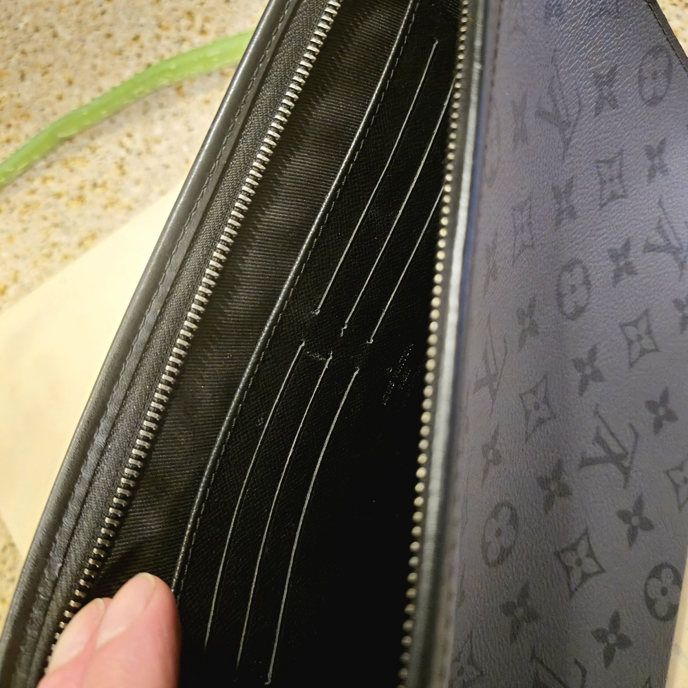 Black Wallet with Multiple Card Slots and Zipper Closure